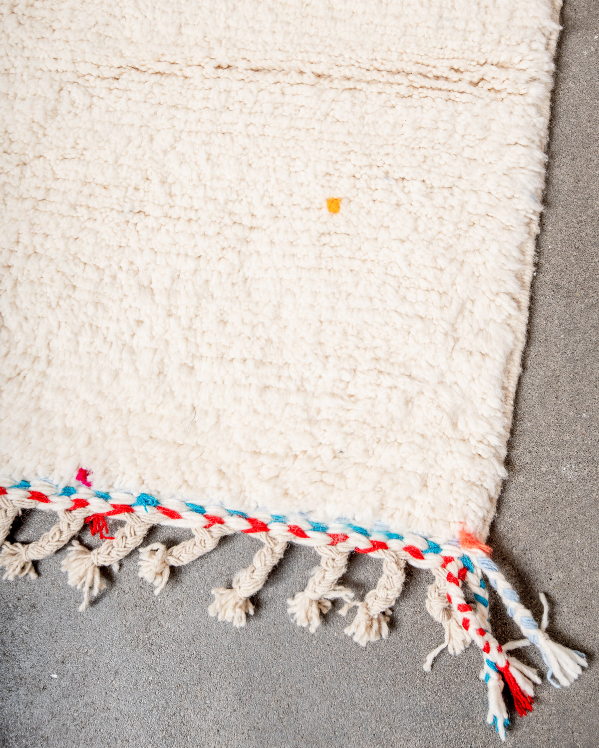 Modern, designer, handcrafted Berber rug from Morocco. Beniourain carpet with beautiful colours and patterns and fluffy wool texture.